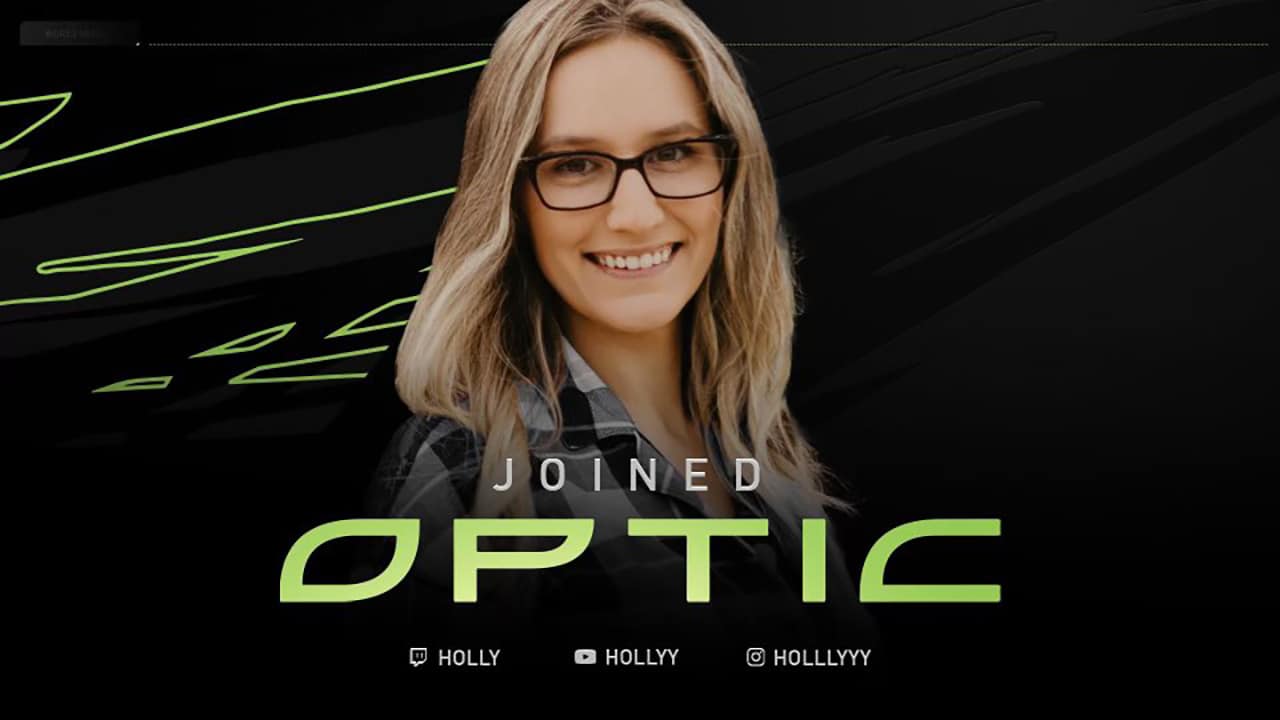 Holly Barlow appears in her grey and white flannelette shirt and glasses. Beneath her the words "Joined Optic" appear in bright neon green