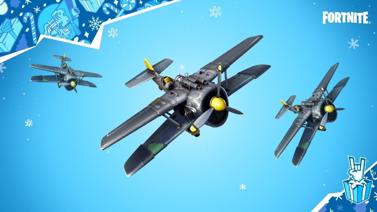 A trio of biplanes soar across a blue background