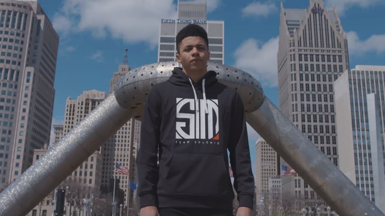 Ali “Myth” Kabbani stands a TSM hoodie in front of the Cincinatti skyline