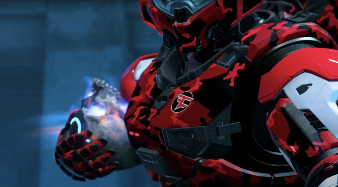 The torso of a Halo character in a red and black space suit can be seen close up. The FaZe Clan logo is visible on the chest