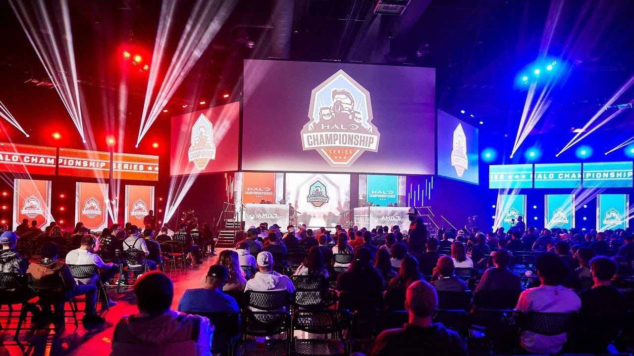 Blue and red lights shine down on the stage as fans watch Day 1 of HCS Raleigh live