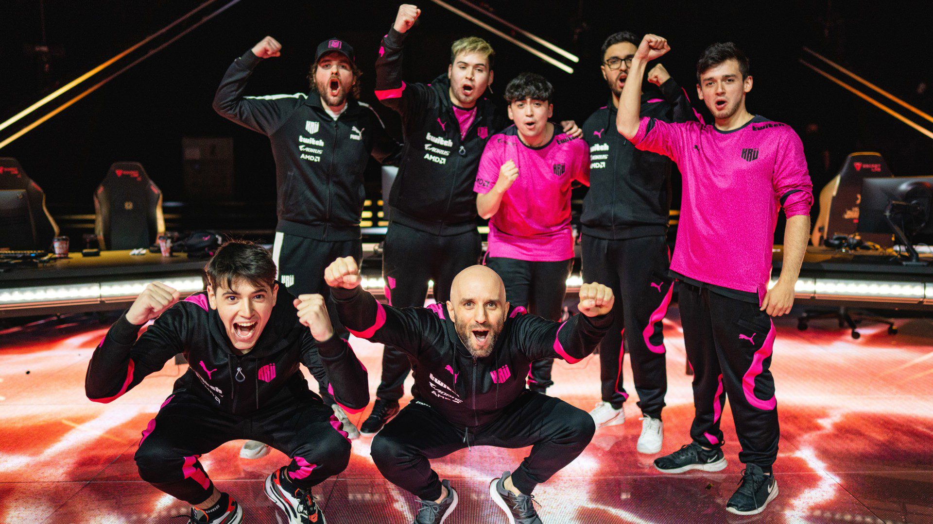 The roster for KRÜ Esports cheer on stage after knocking out the Sentinels at the Valorant Champions event