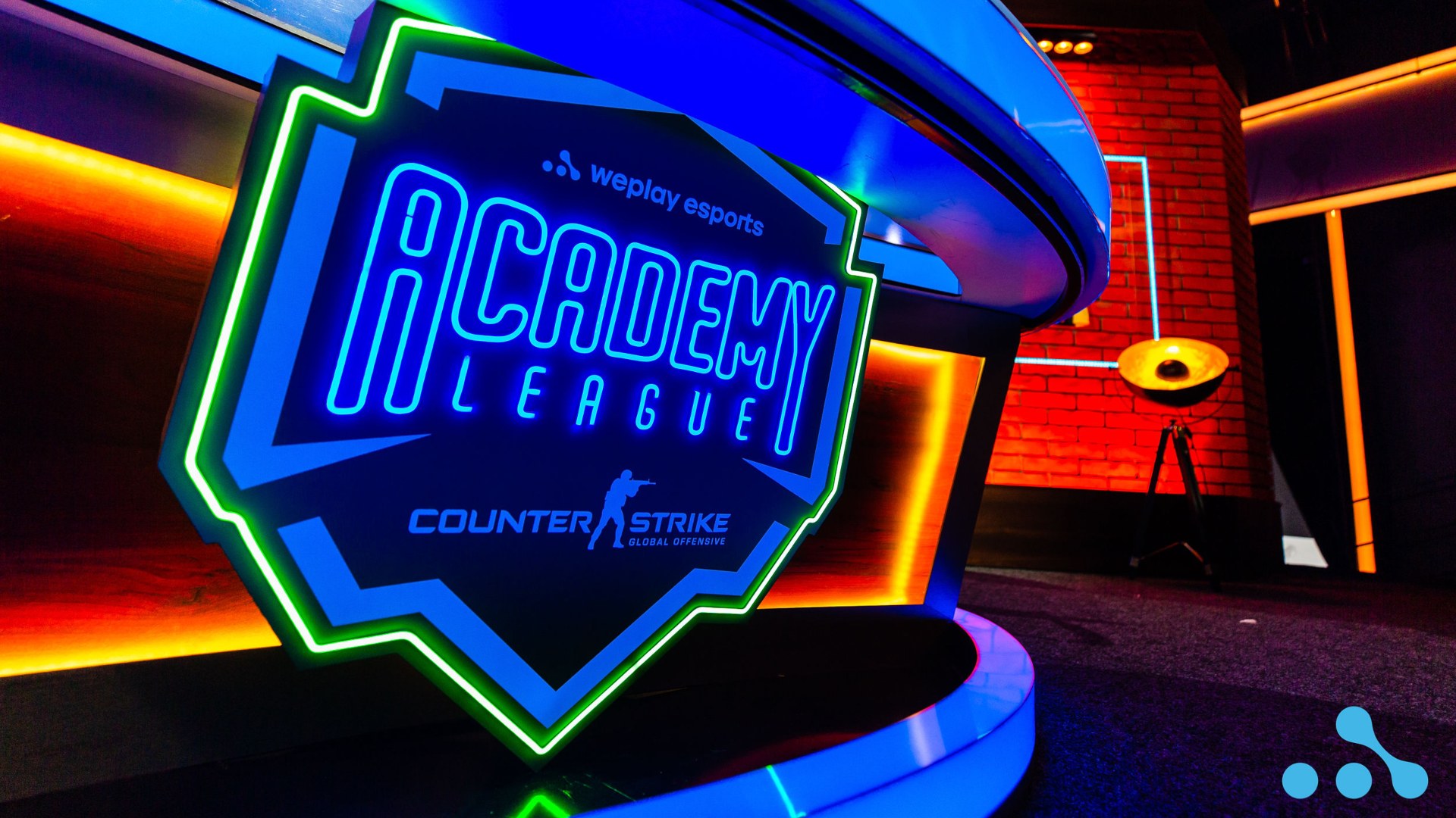 A photo of WePlay Academy League logo in their studio for CS:GO tournament.