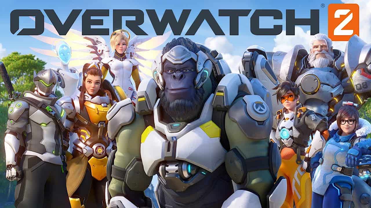 The cast of heroes from Overwatch stands under a sunny sky together with the Overwatch 2 logo above their heads.