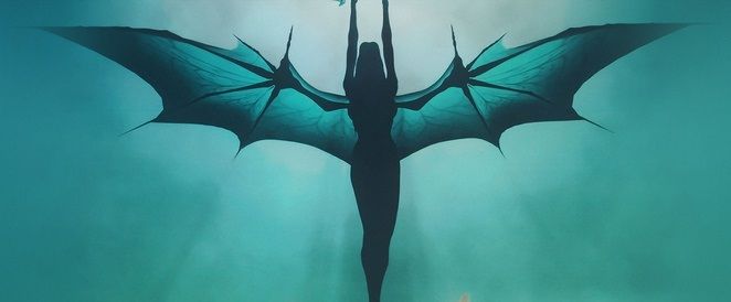 Silhouette of a succubus-type creature with bat wings and arms stretched overhead