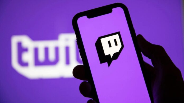 The Twitch logo appears against a purple background on a smartphone screen