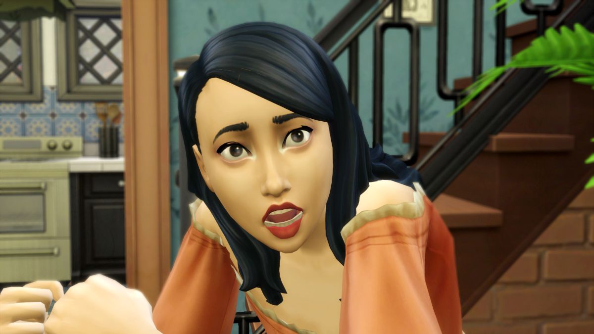 A close up of a female sim in The Sims 4 with medium-length black hair and an off-the-shoulder orange top. She