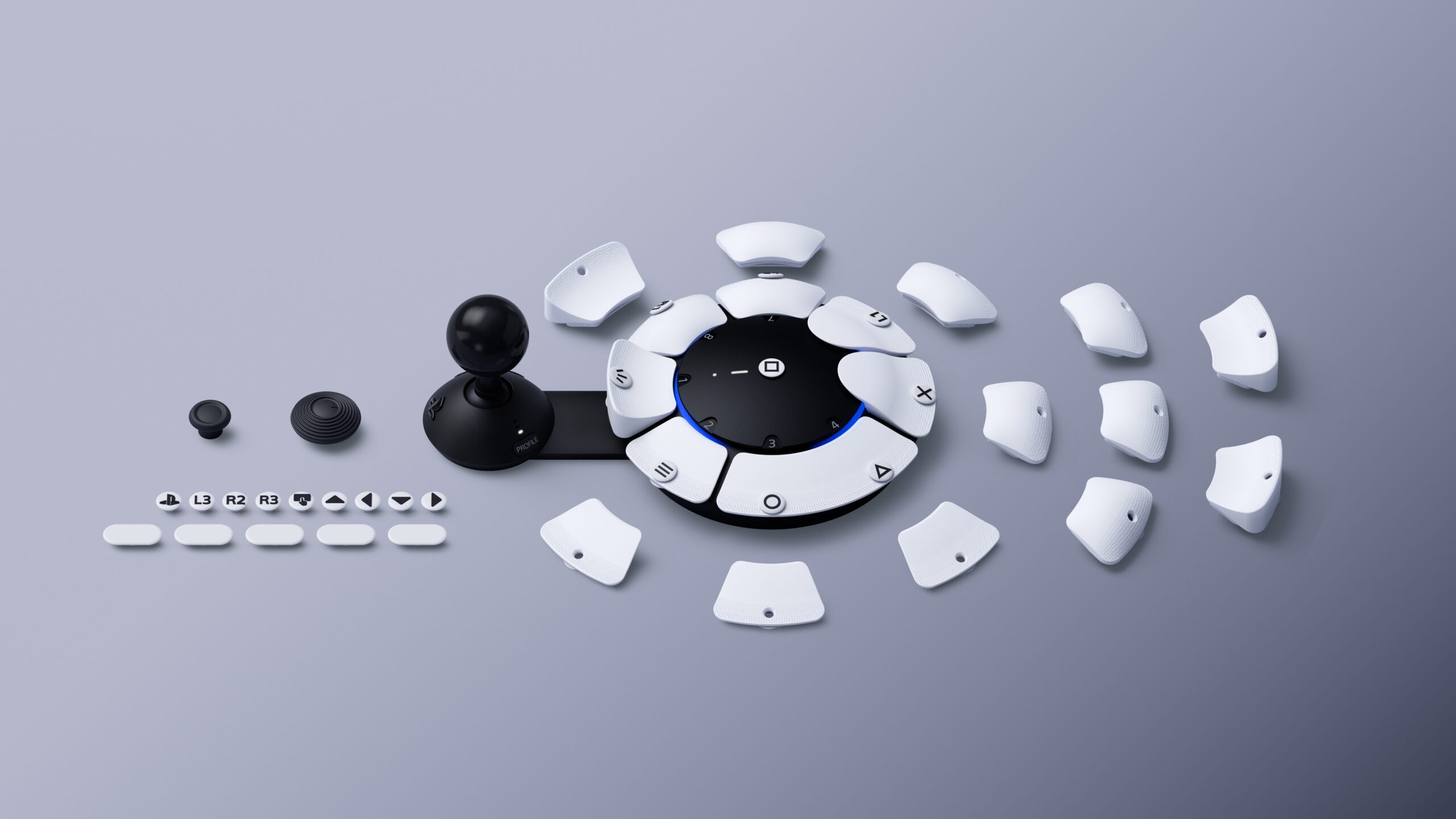 Image shows the Access Controller laid out flat, with its customizable pieces spread out around it.