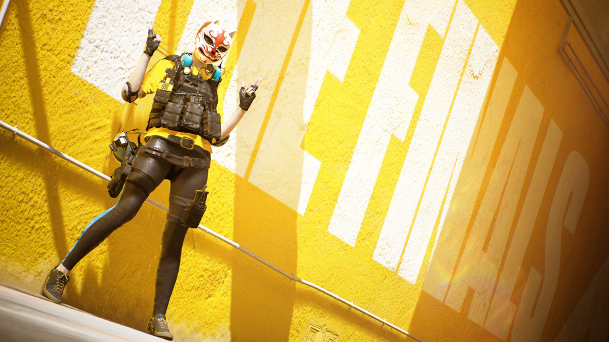 A character from The Finals poses in front of a wall with