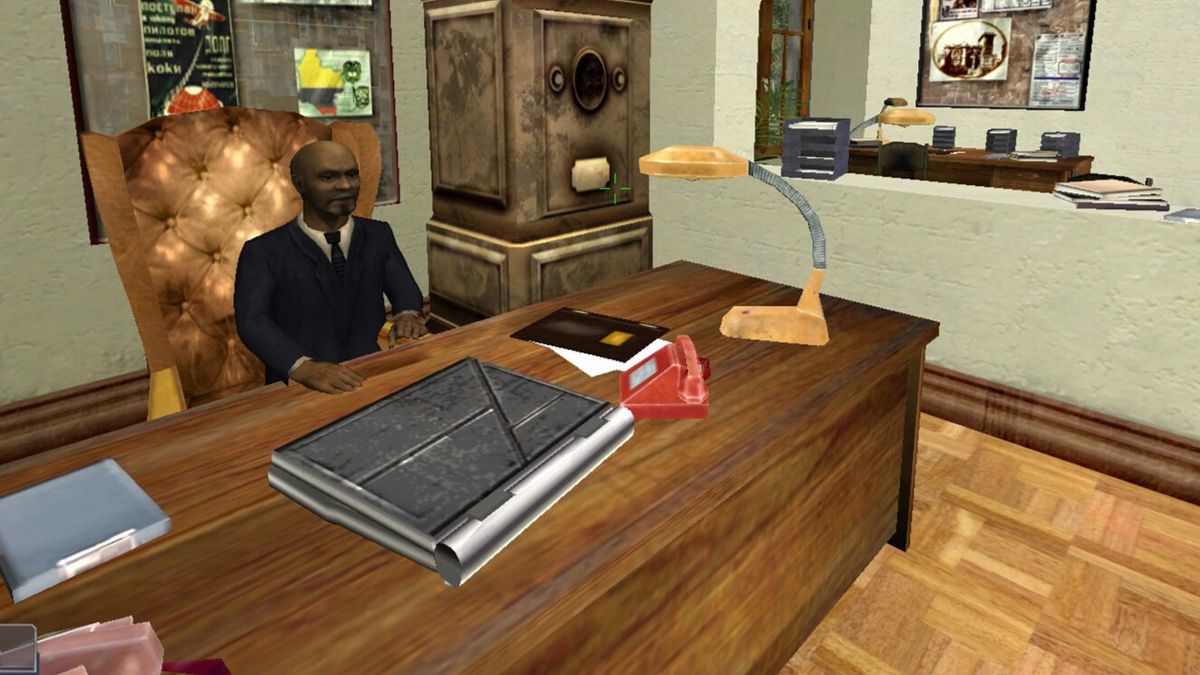 A man sits at a desk in Boiling Point.