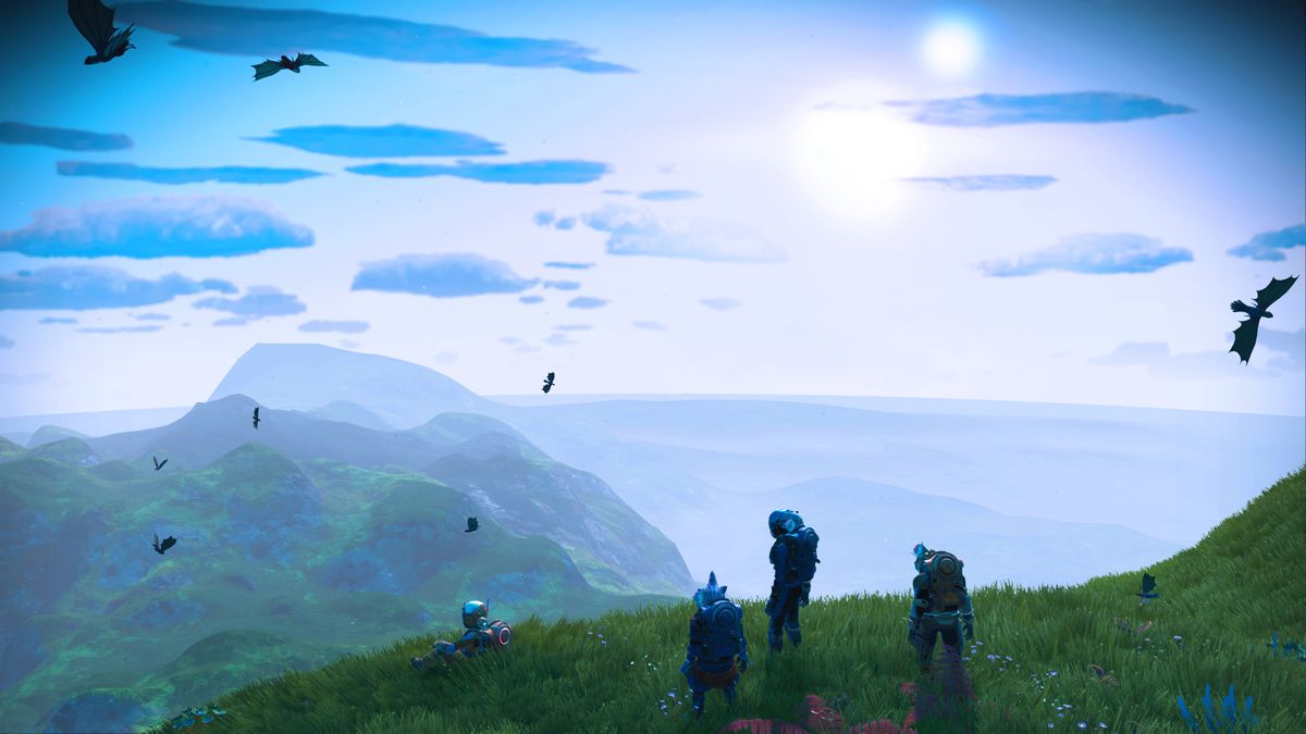 Space explorers looking out over a planet in No Man