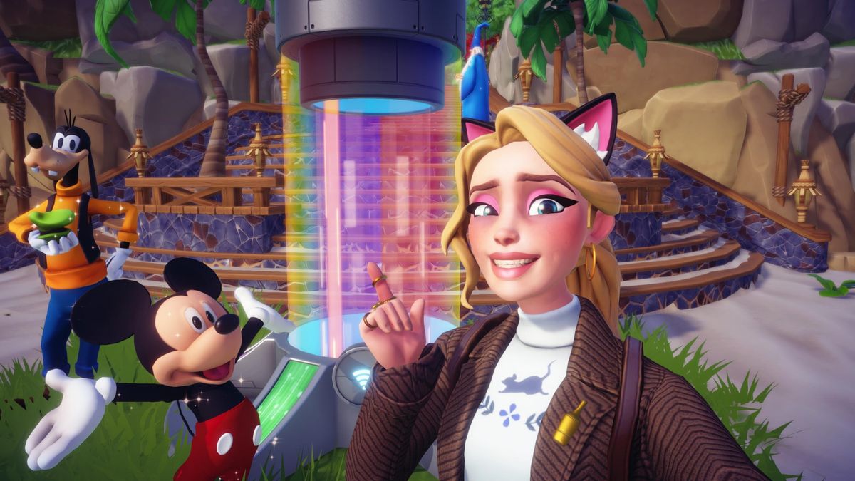 Disney Dreamlight Valley - a player wearing cat ears and a sweater takes a selfie pointing nervously to a rainbow Valley Visits teleporter while MIckey and Goofy pose nearby