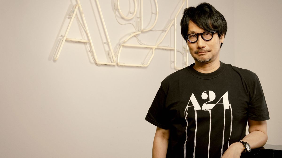 Hideo Kojima standing in front of an A24 logo