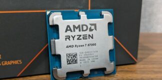 AMD Ryzen 7 8700G leaning against its box
