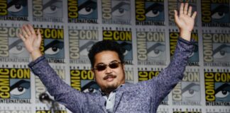 SAN DIEGO, CALIFORNIA - JULY 21: Katsuhiro Harada waves to the crowd at the Tekken 8: The Art of Fighting panel at 2023 Comic-Con International: San Diego at San Diego Convention Center on July 21, 2023 in San Diego, California